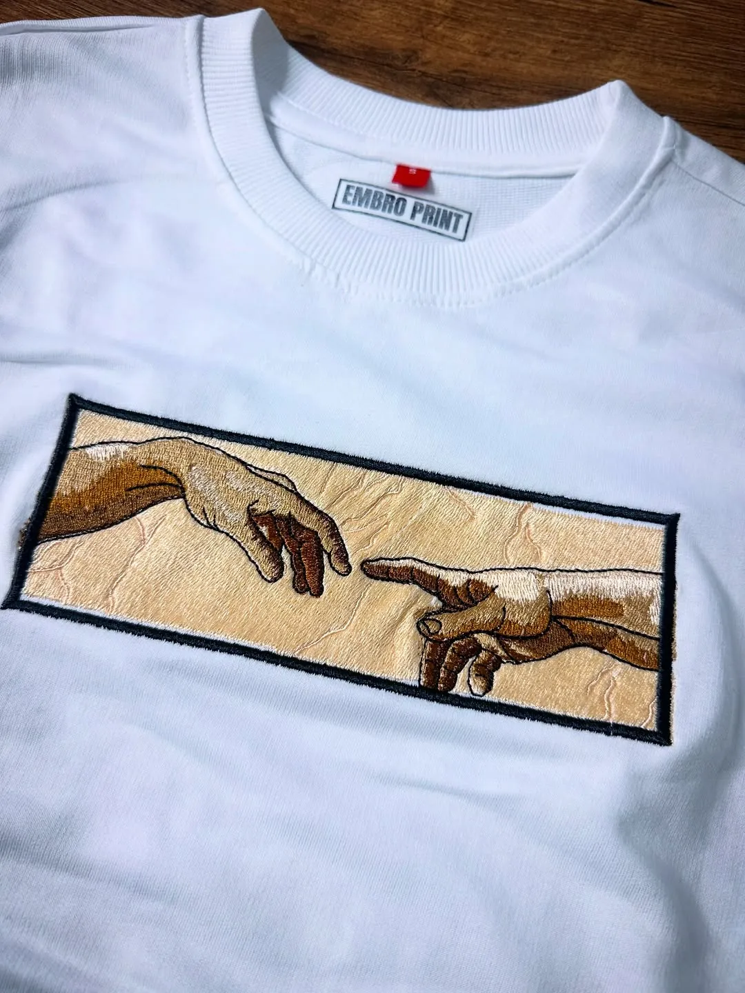Embroidered hand artwork
